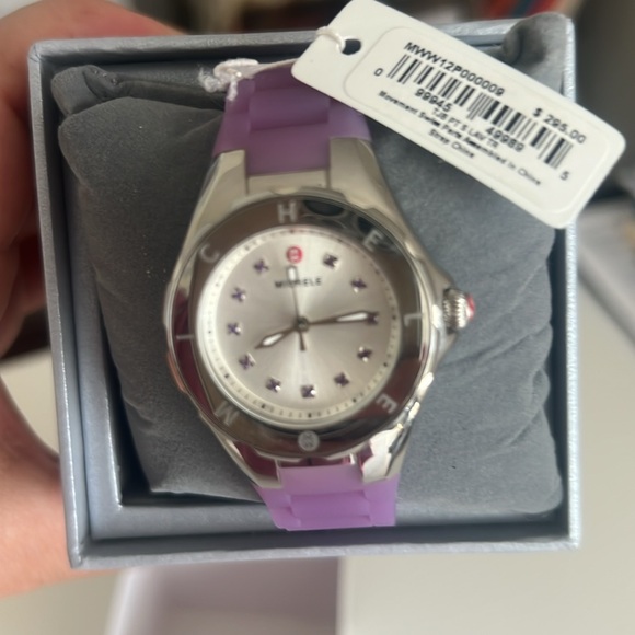 BrandMichelle purple watch with tags. Weard one time ONLY....